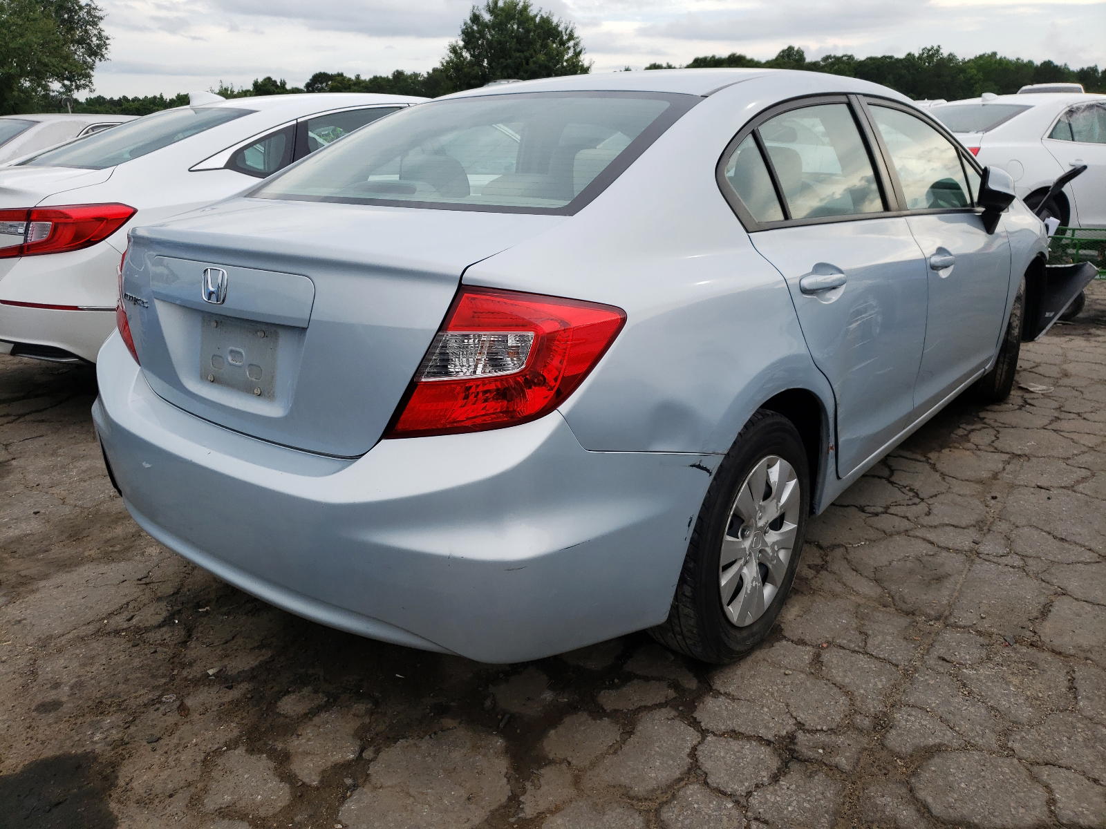 Photo 4 from auction – 2012 HONDA CIVIC LX with VIN 2HGFB2F52CH509883