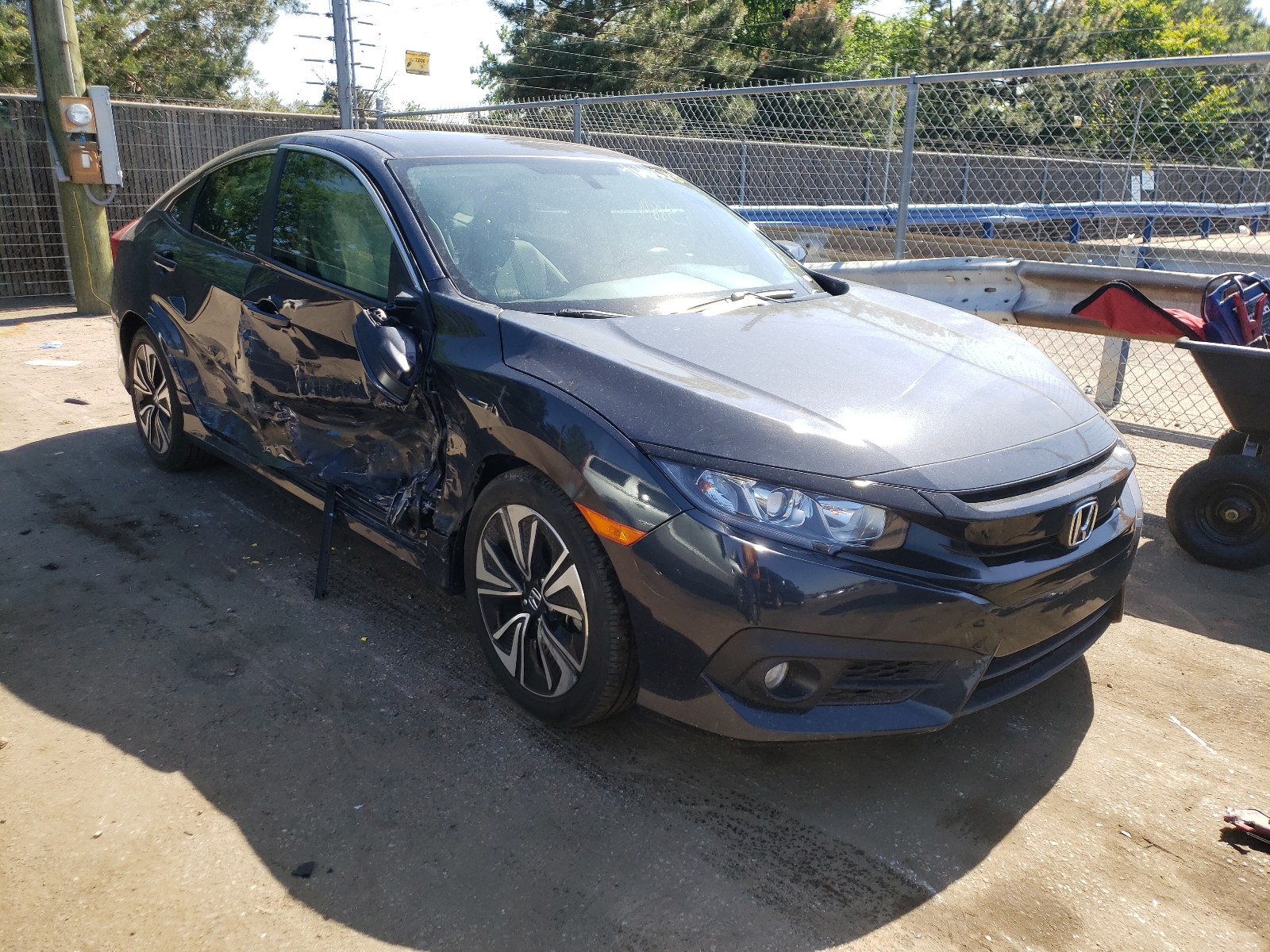 HONDA CIVIC EX 2018 with VIN JHMFC1F38JX018049 - Photo from auction