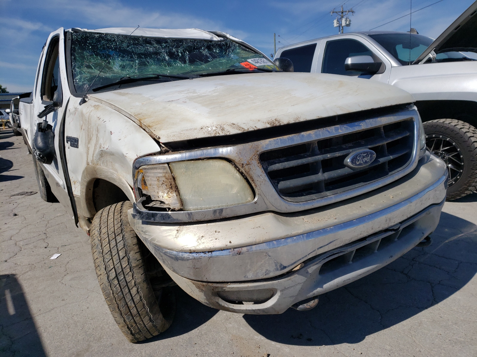 Photo 9 from auction – 2003 FORD F150 with VIN 1FTRX18L73NB11594