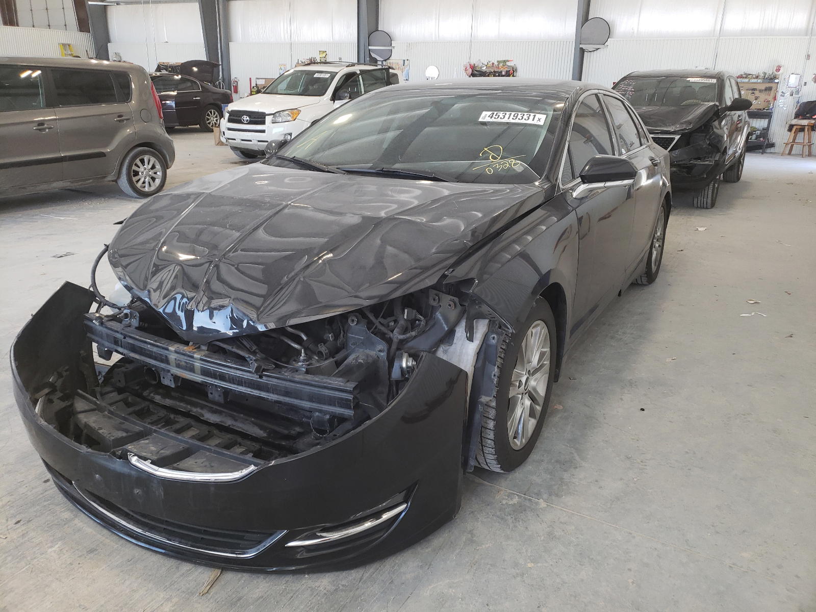 Photo 2 from auction – 2014 LINCOLN MKZ with VIN 3LN6L2J90ER830328