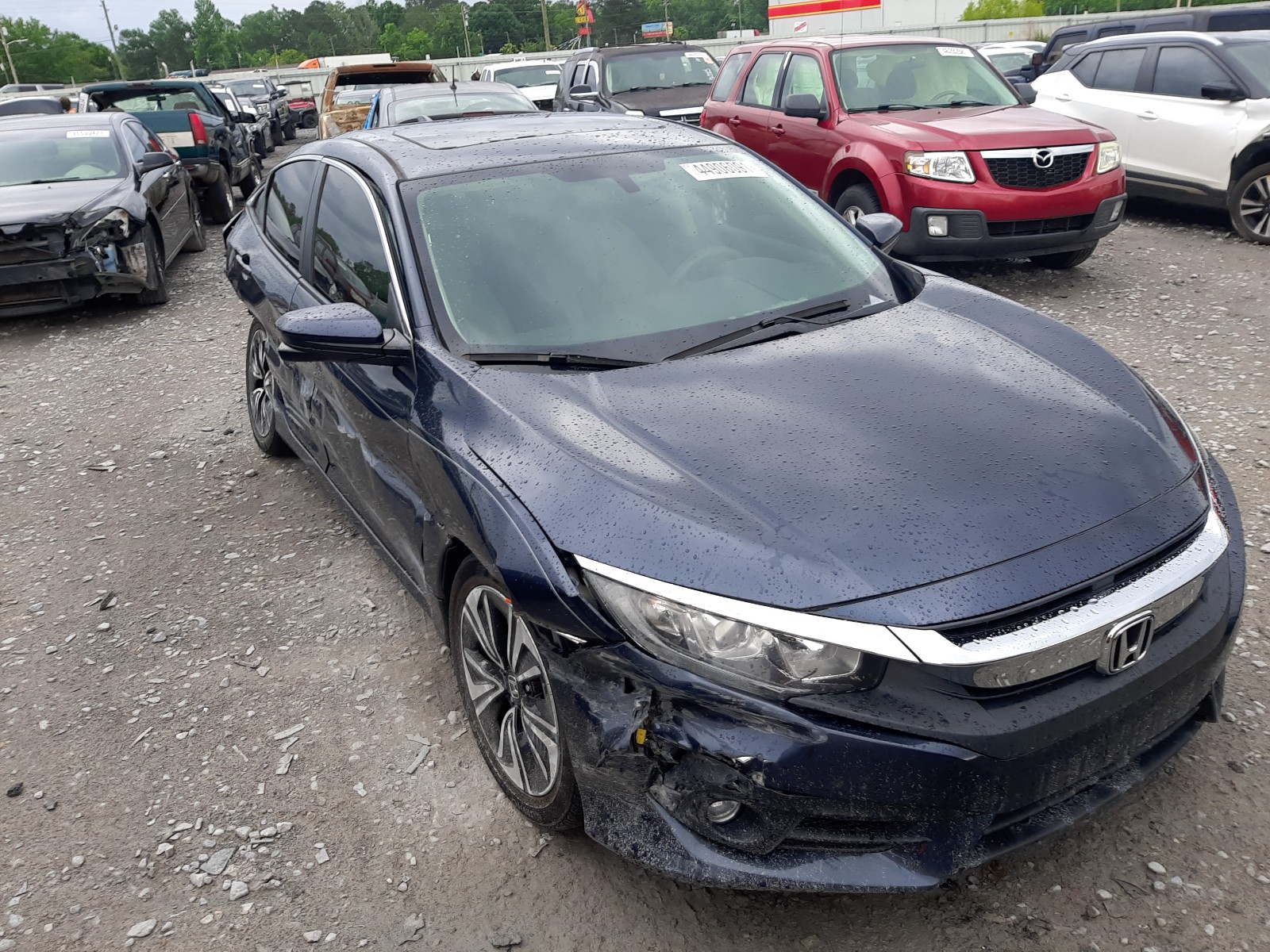 HONDA CIVIC EX 2016 with VIN 19XFC1F30GE024373 - Photo from auction