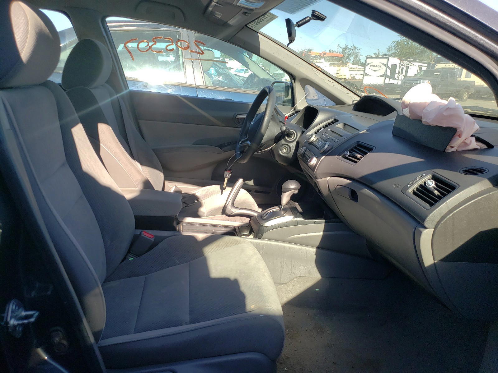 Photo 5 from auction – 2010 HONDA CIVIC LX with VIN 19XFA1F58AE024586