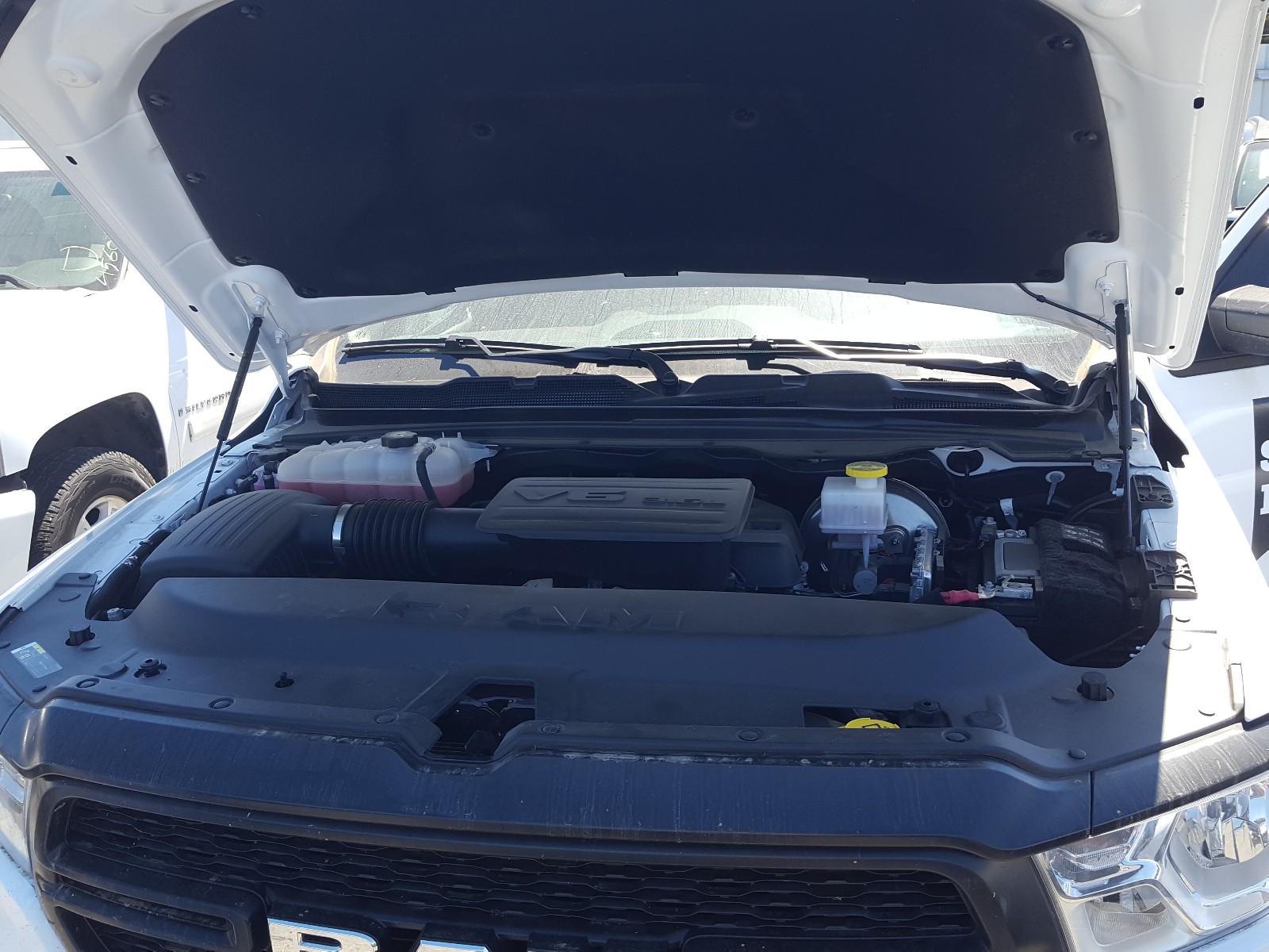 Photo 7 from auction – 2020 RAM 1500 TRADE with VIN 1C6SRECG5LN385977