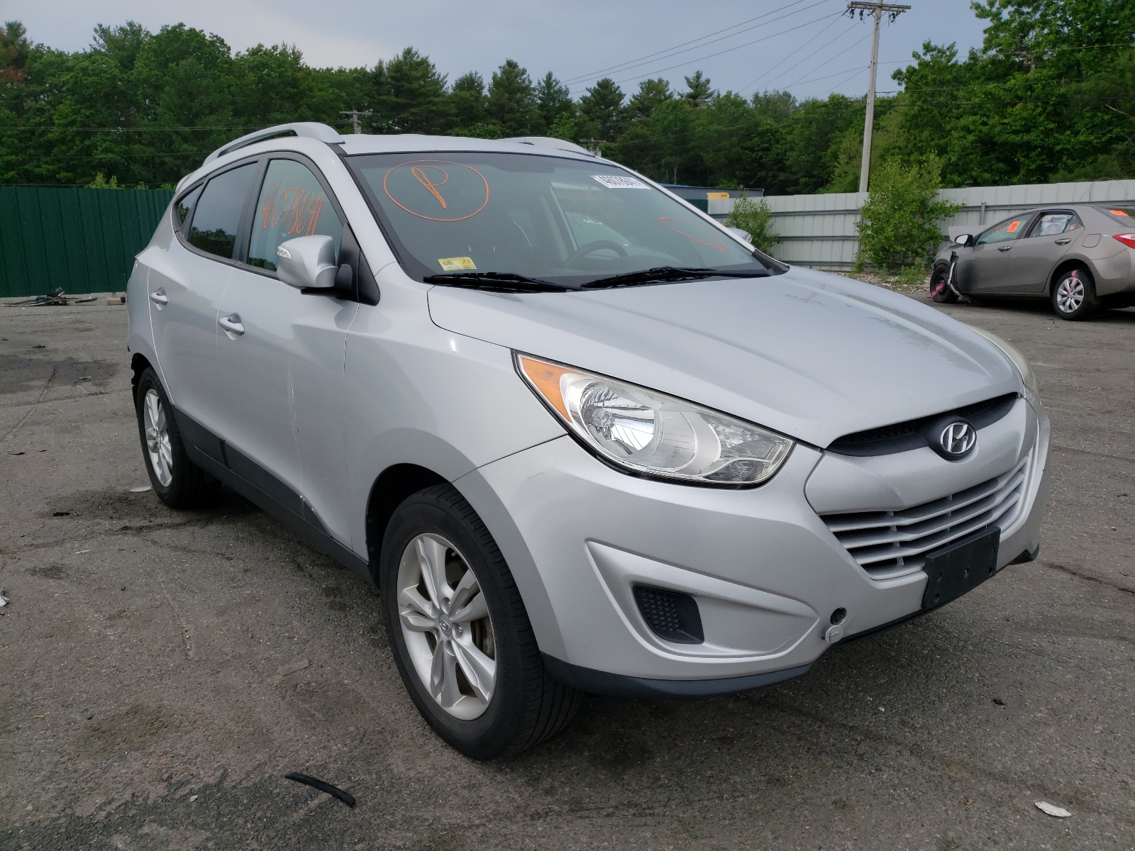 HYUNDAI TUCSON GLS 2012 with VIN KM8JUCAC0CU473778 - Photo from auction