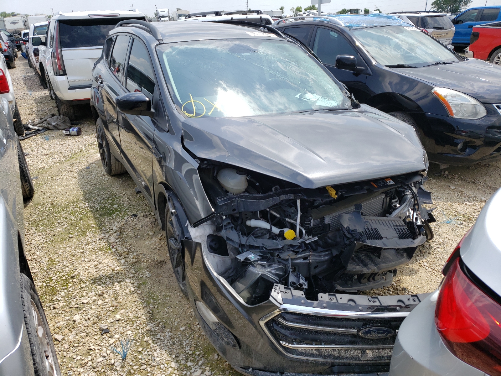 Photo 1 from auction – 2017 FORD ESCAPE SE with VIN 1FMCU0GD0HUD11910