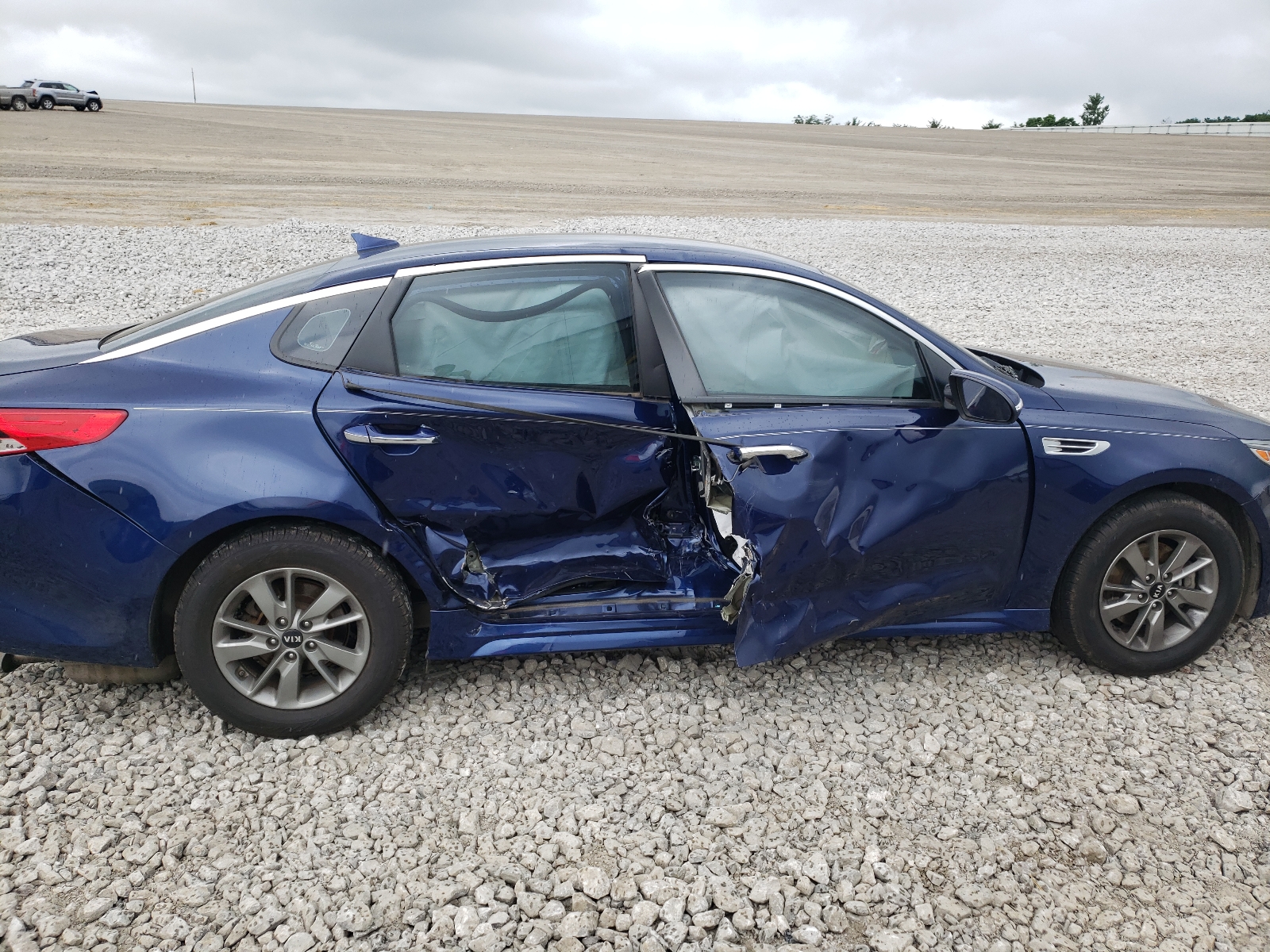 Photo 9 from auction – 2016 KIA OPTIMA LX with VIN 5XXGT4L11GG011972