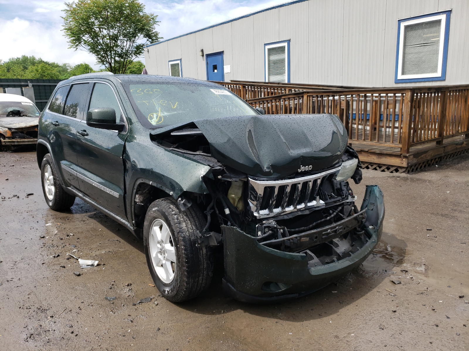 JEEP GRAND CHER 2011 with VIN 1J4RR4GG2BC660950 - Photo from auction