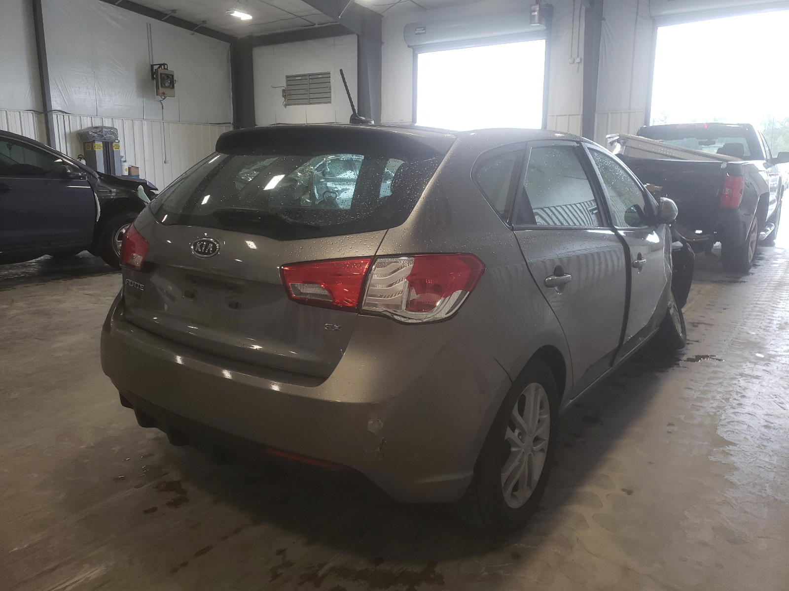Photo 4 from auction – 2011 KIA FORTE EX with VIN KNAFU5A29B5381636