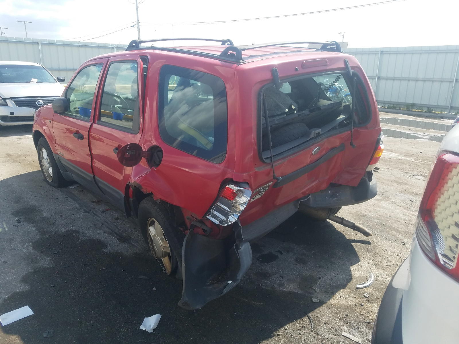 Photo 3 from auction – 2002 FORD ESCAPE XLS with VIN 1FMYU021X2KB77199