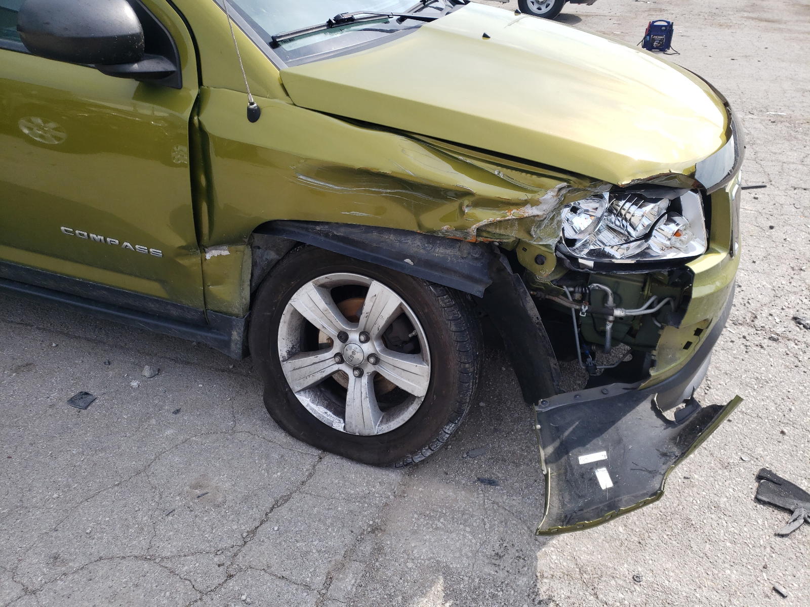 Photo 9 from auction – 2012 JEEP COMPASS LA with VIN 1C4NJDEB4CD559262