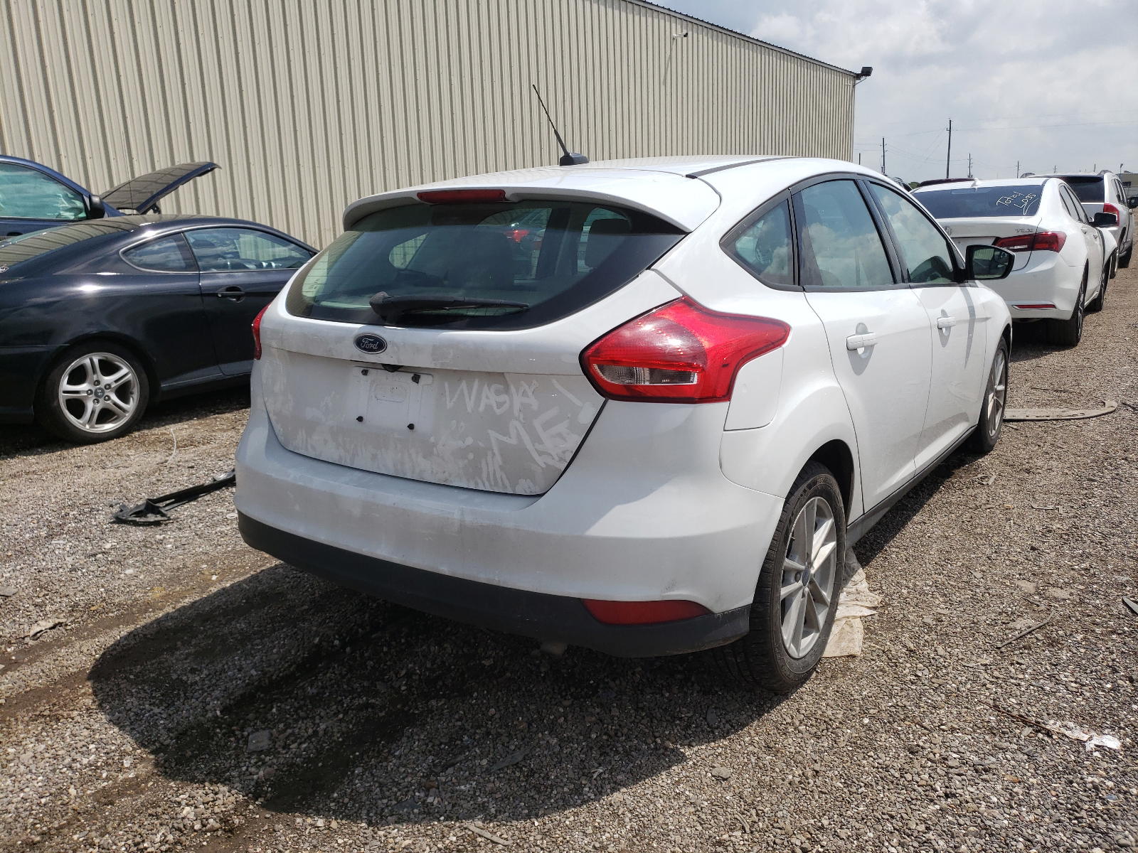Photo 4 from auction – 2018 FORD FOCUS SE with VIN 1FADP3K23JL295047