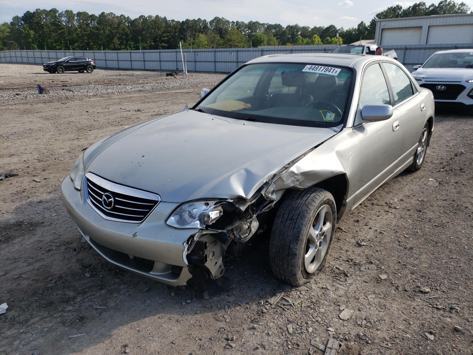 Photo 2 from auction – 2002 MAZDA MILLENIA with VIN JM1TA221821725340