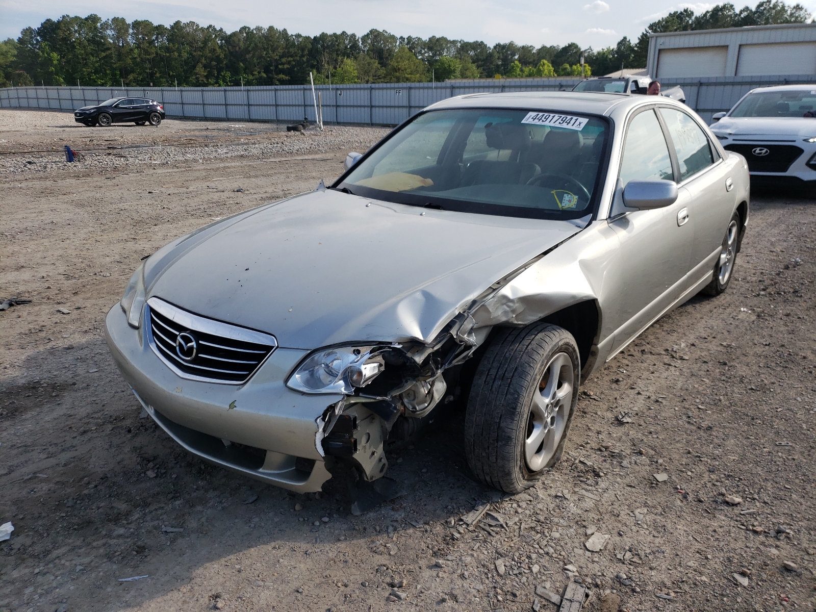 Фото 2 с аукциона – 2002 MAZDA MILLENIA с VIN JM1TA221821725340