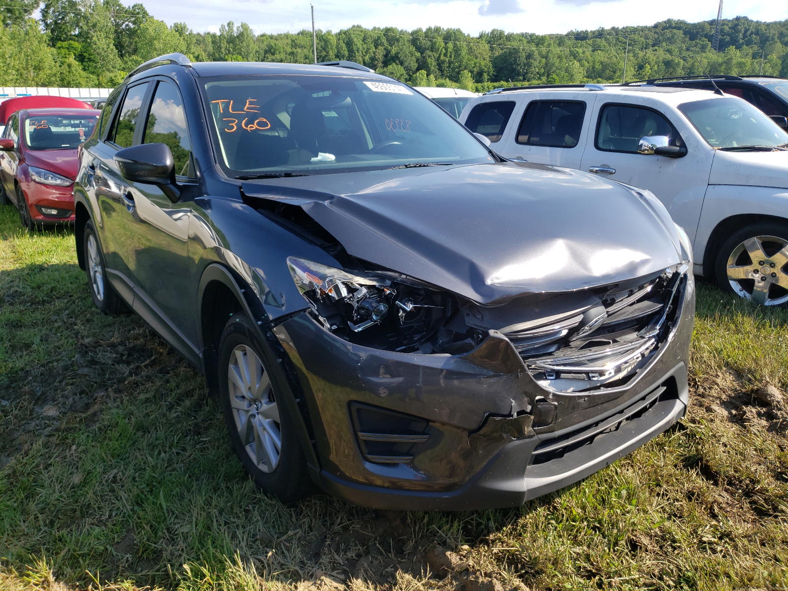 MAZDA CX-5 SPORT 2016 with VIN JM3KE2BY1G0846292 - Photo from auction