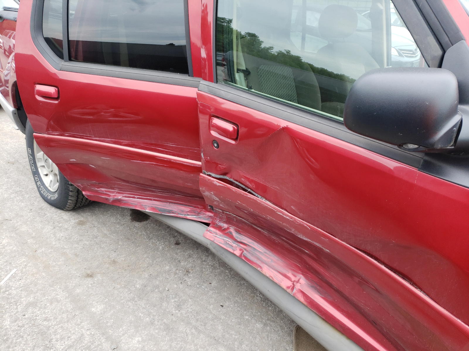 Photo 9 from auction – 2003 FORD EXPLORER S with VIN 1FMZU77E13UB65795