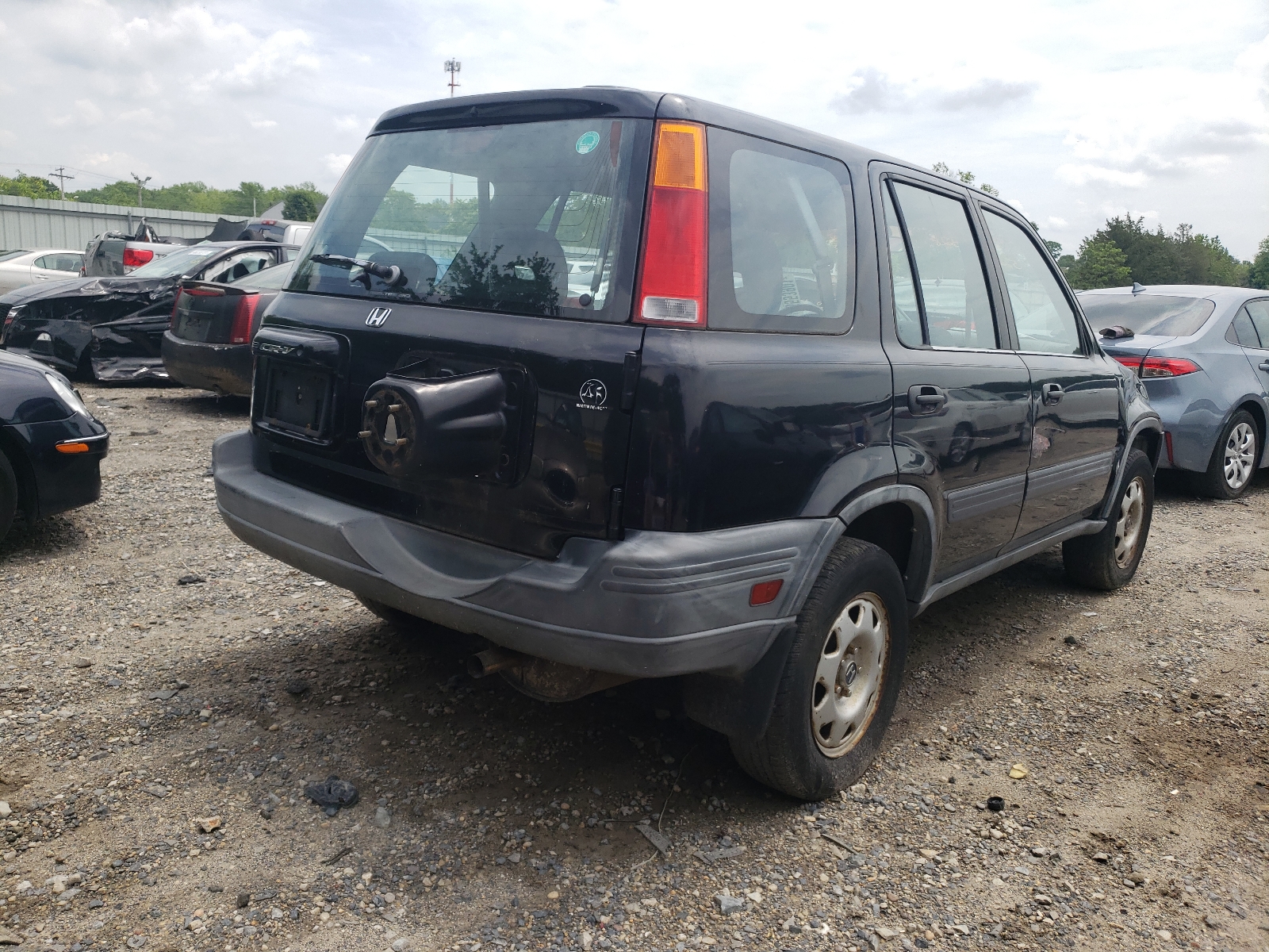 Photo 4 from auction – 1998 HONDA CR-V LX with VIN JHLRD1849WC071622
