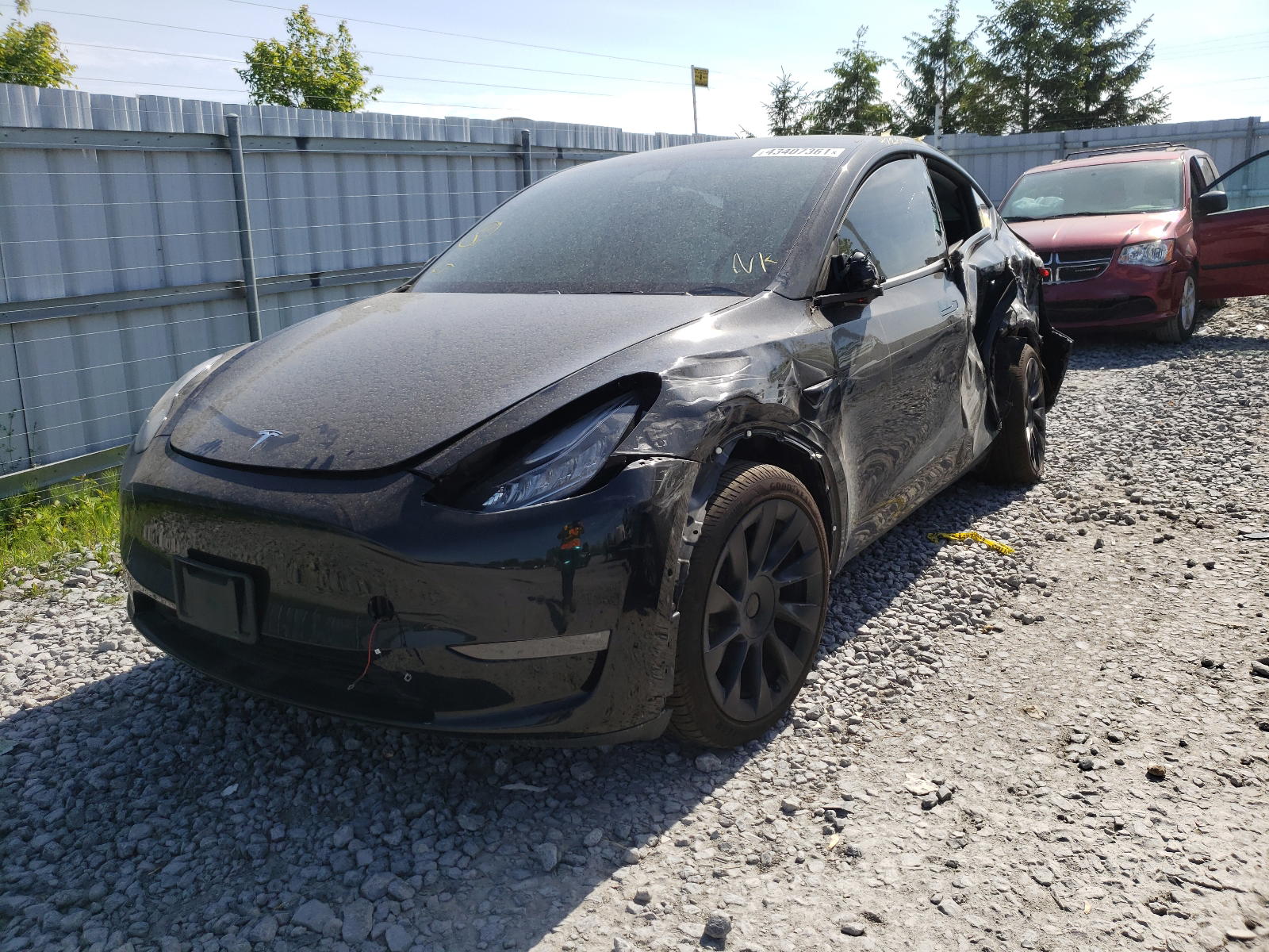 Photo 2 from auction – 2021 TESLA MODEL Y with VIN 5YJYGDEE0MF081177