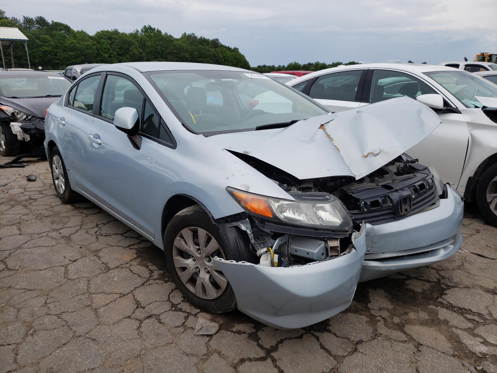 HONDA CIVIC LX 2012 with VIN 2HGFB2F52CH509883 - Photo from auction