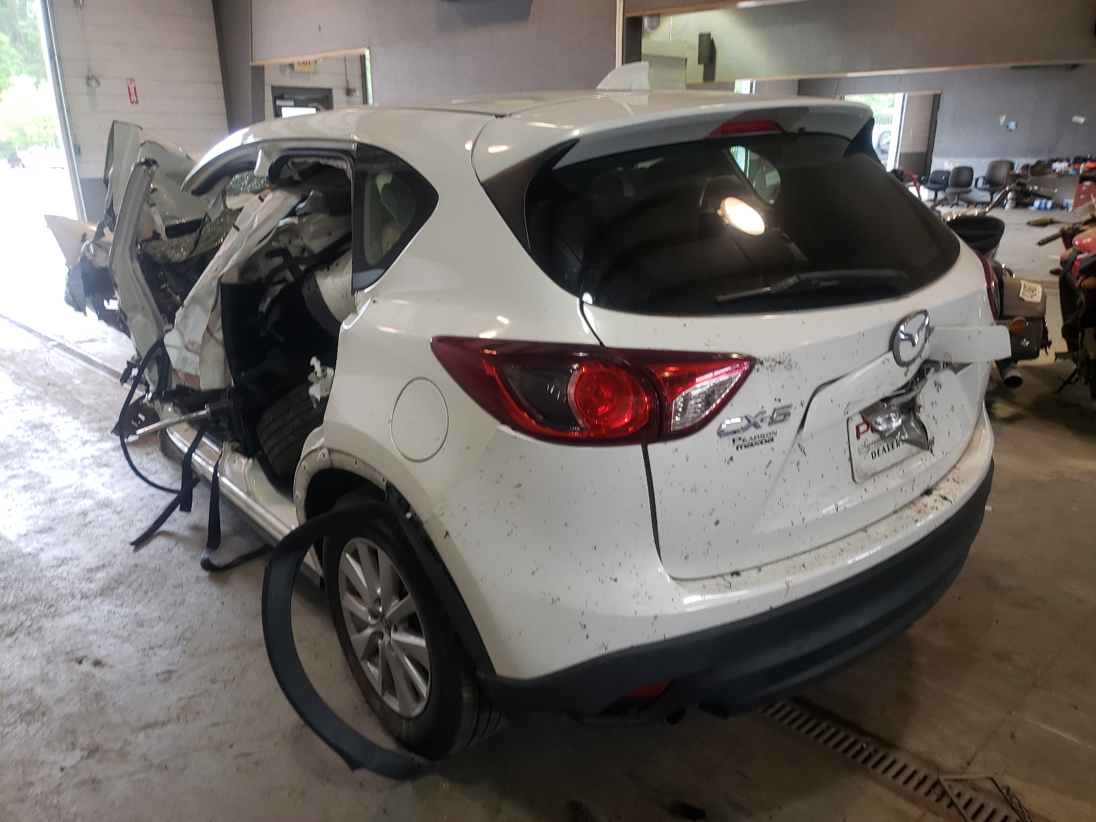 Photo 3 from auction – 2015 MAZDA CX-5 SPORT with VIN JM3KE2BE1F0494478