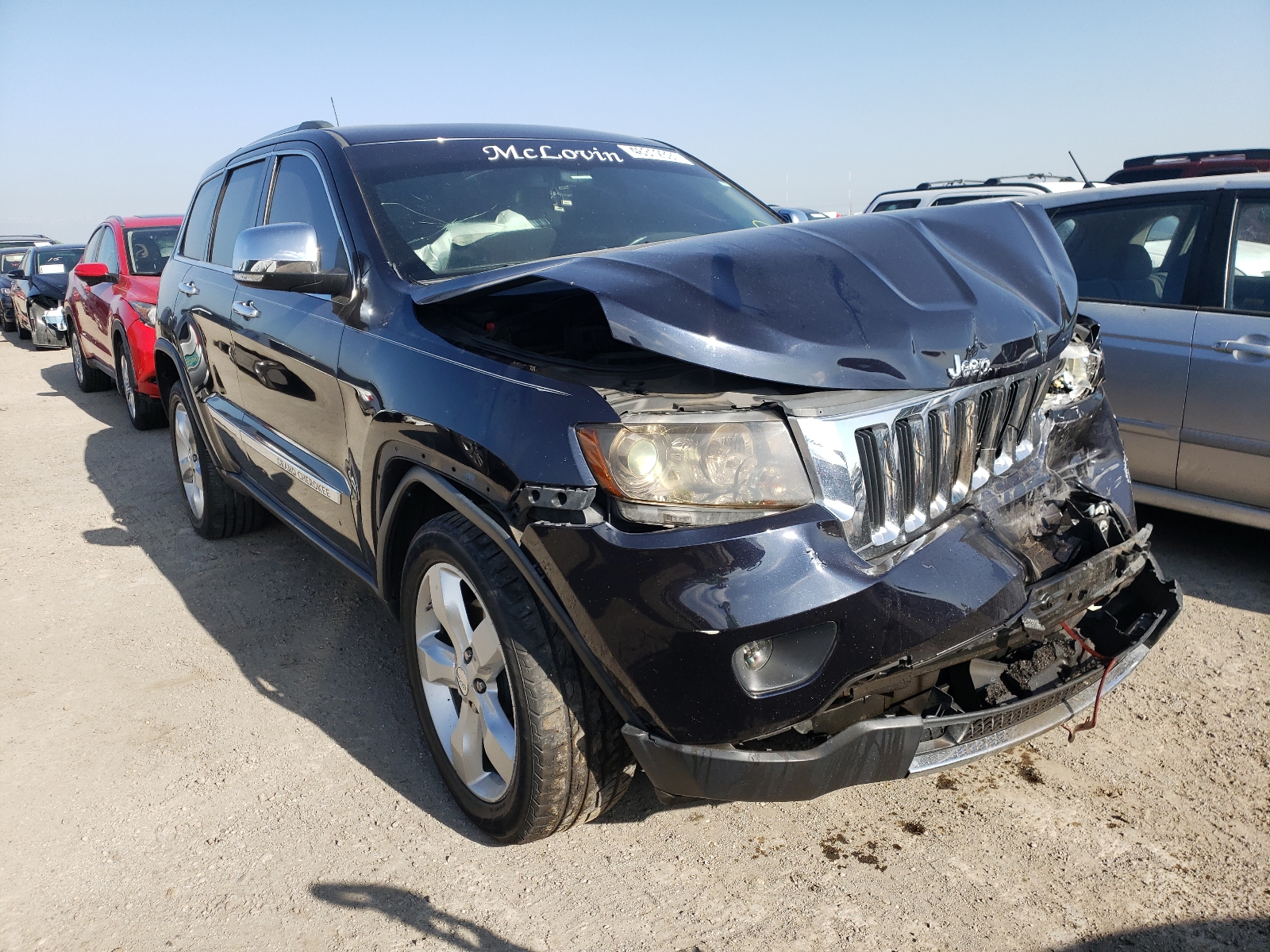 JEEP GRAND CHER 2011 with VIN 1J4RR5GTXBC501239 - Photo from auction