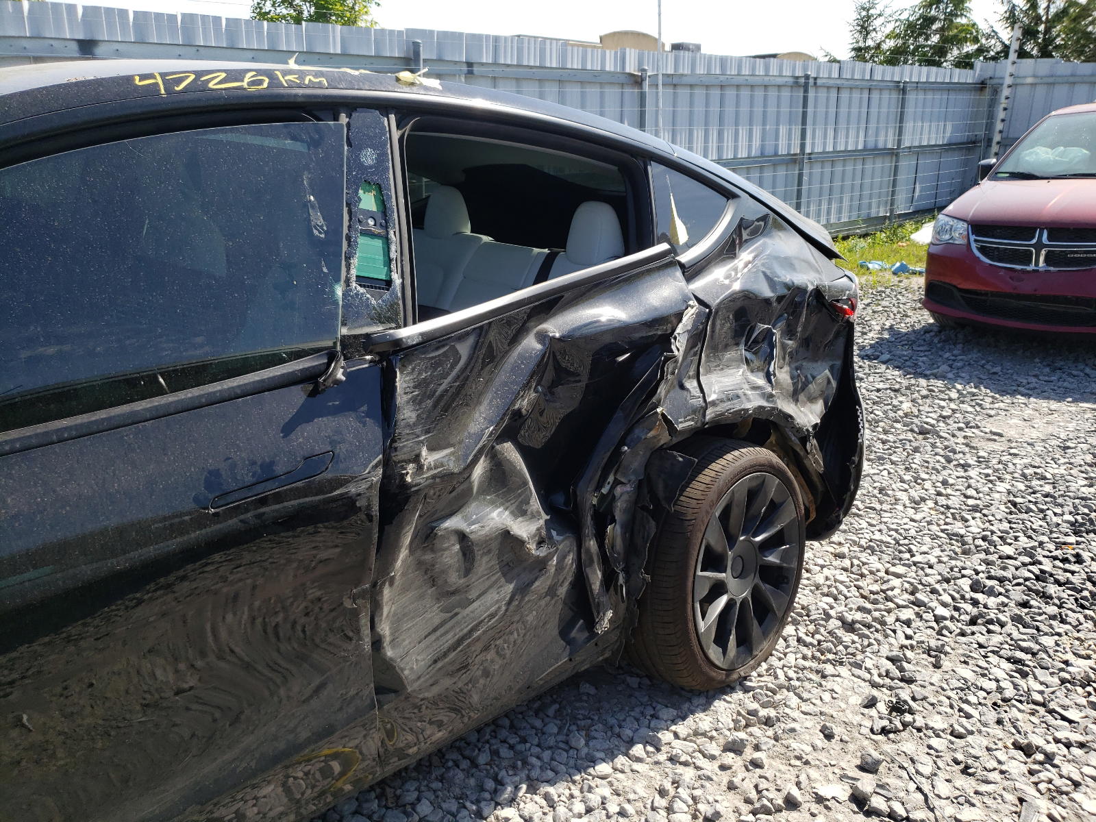 Photo 9 from auction – 2021 TESLA MODEL Y with VIN 5YJYGDEE0MF081177