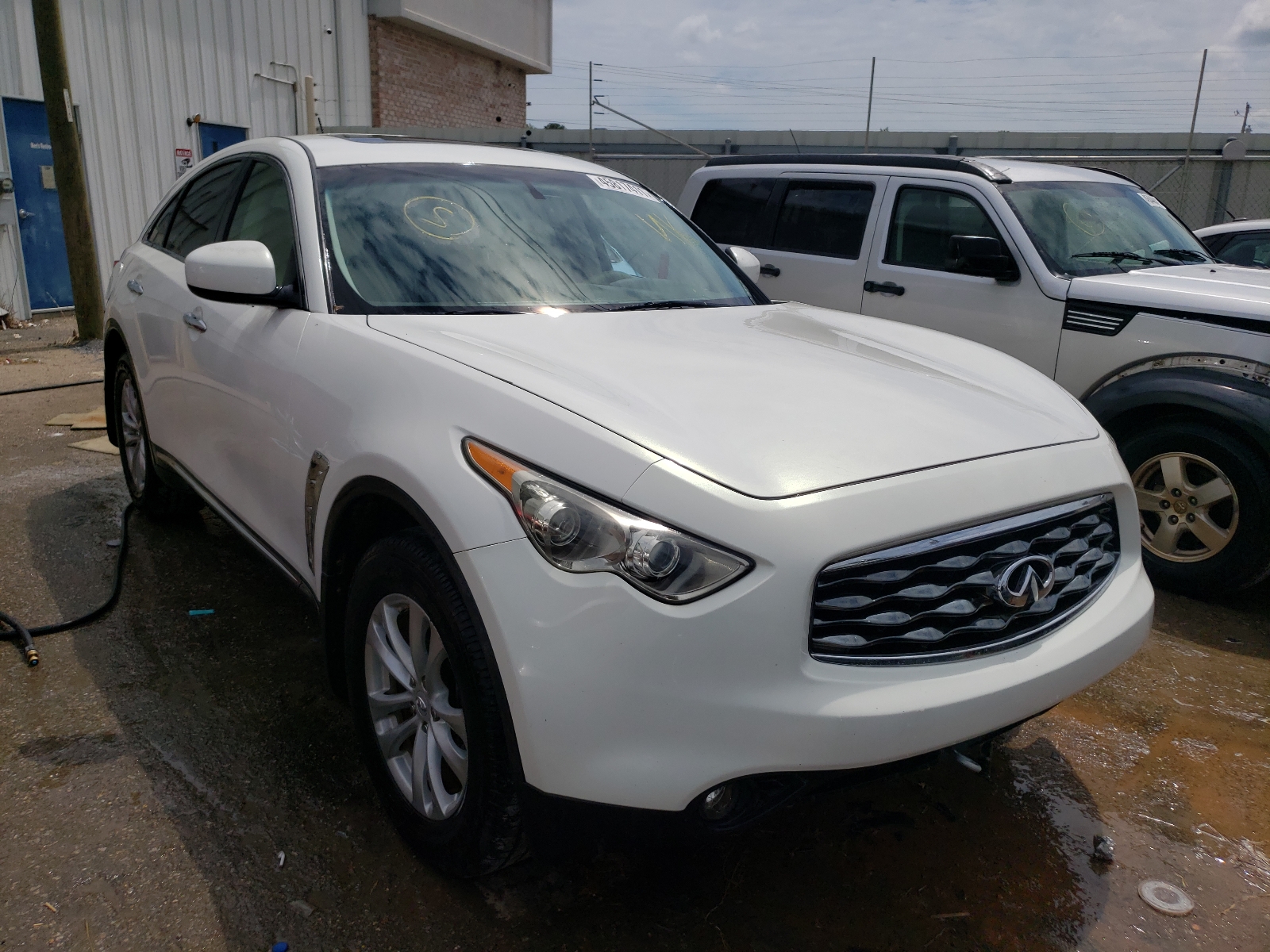 INFINITI FX35 2011 with VIN JN8AS1MW2BM734318 - Photo from auction