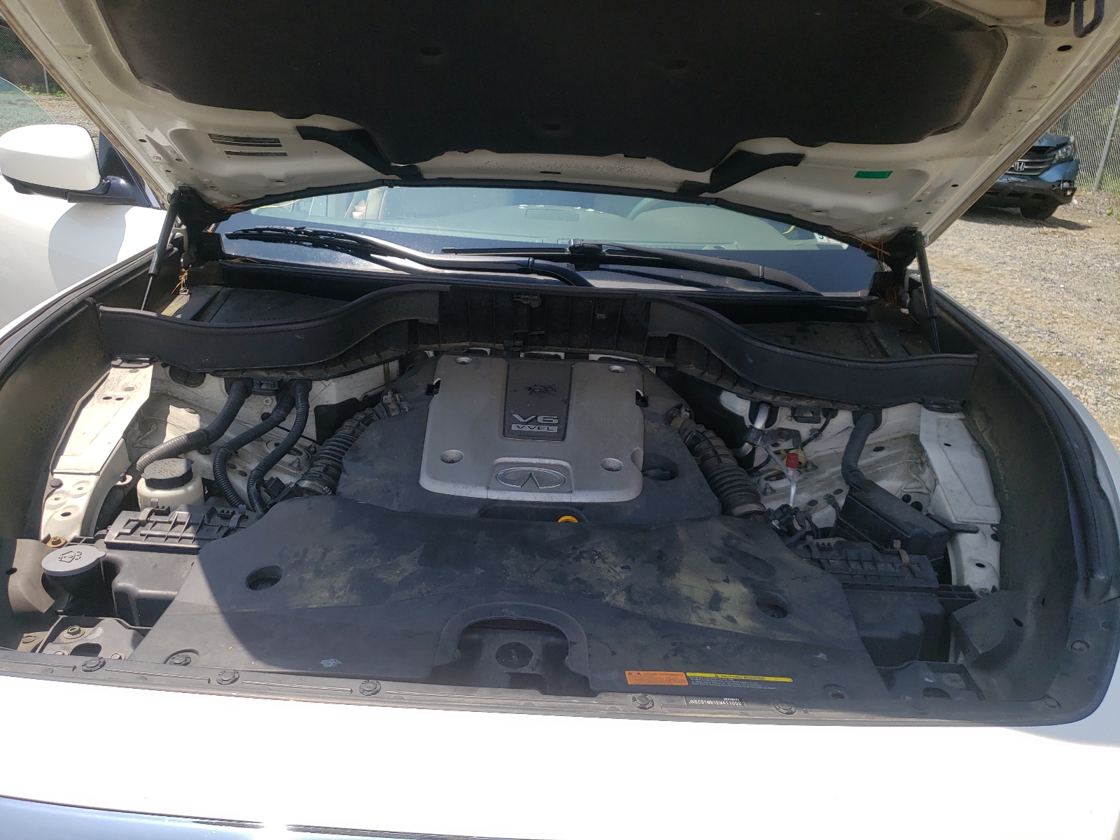 Photo 7 from auction – 2014 INFINITI QX70 with VIN JN8CS1MW1EM411052