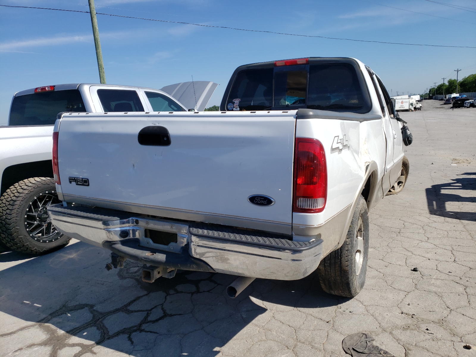 Photo 4 from auction – 2003 FORD F150 with VIN 1FTRX18L73NB11594
