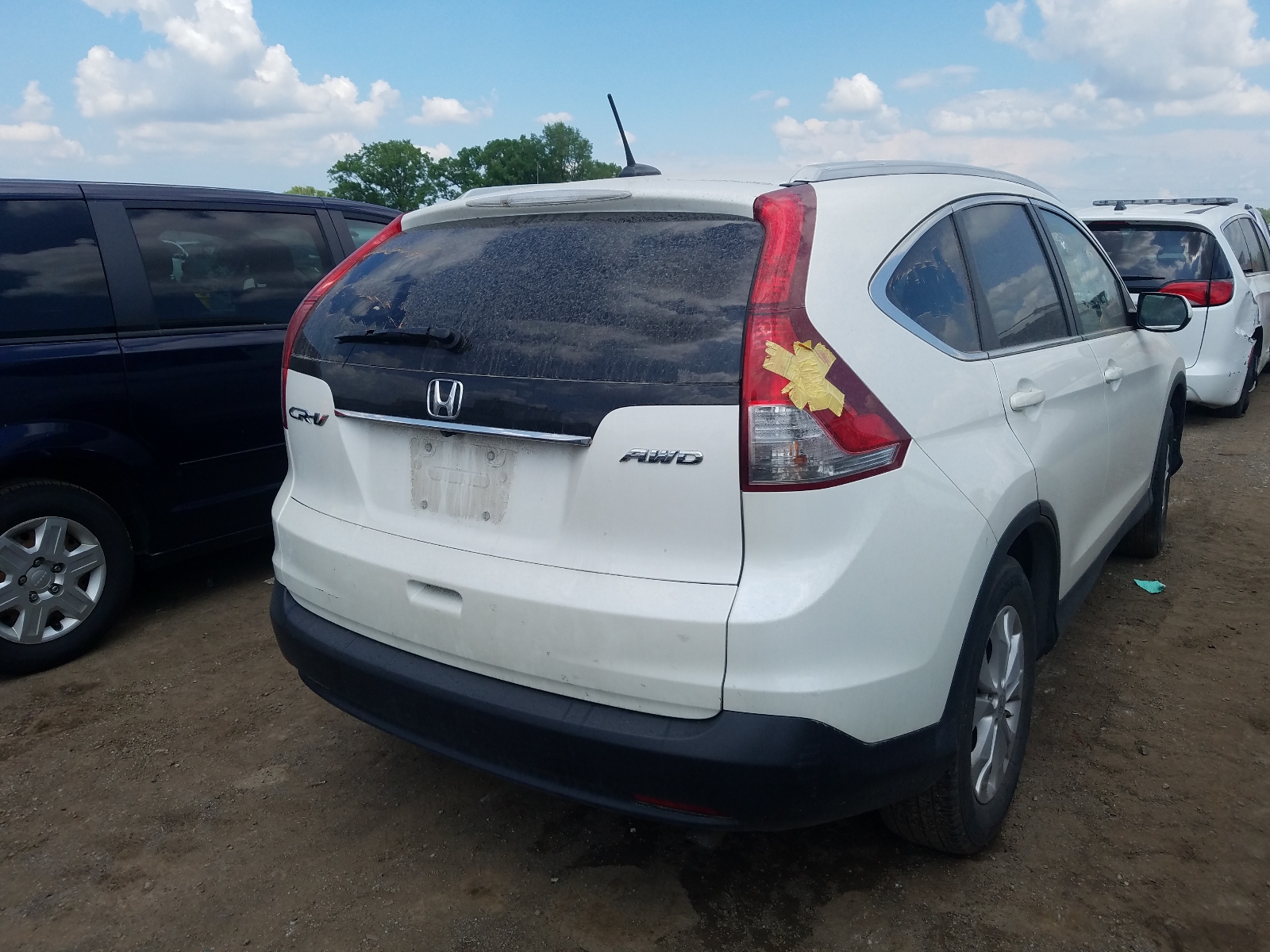Photo 4 from auction – 2013 HONDA CR-V EXL with VIN 5J6RM4H75DL039718