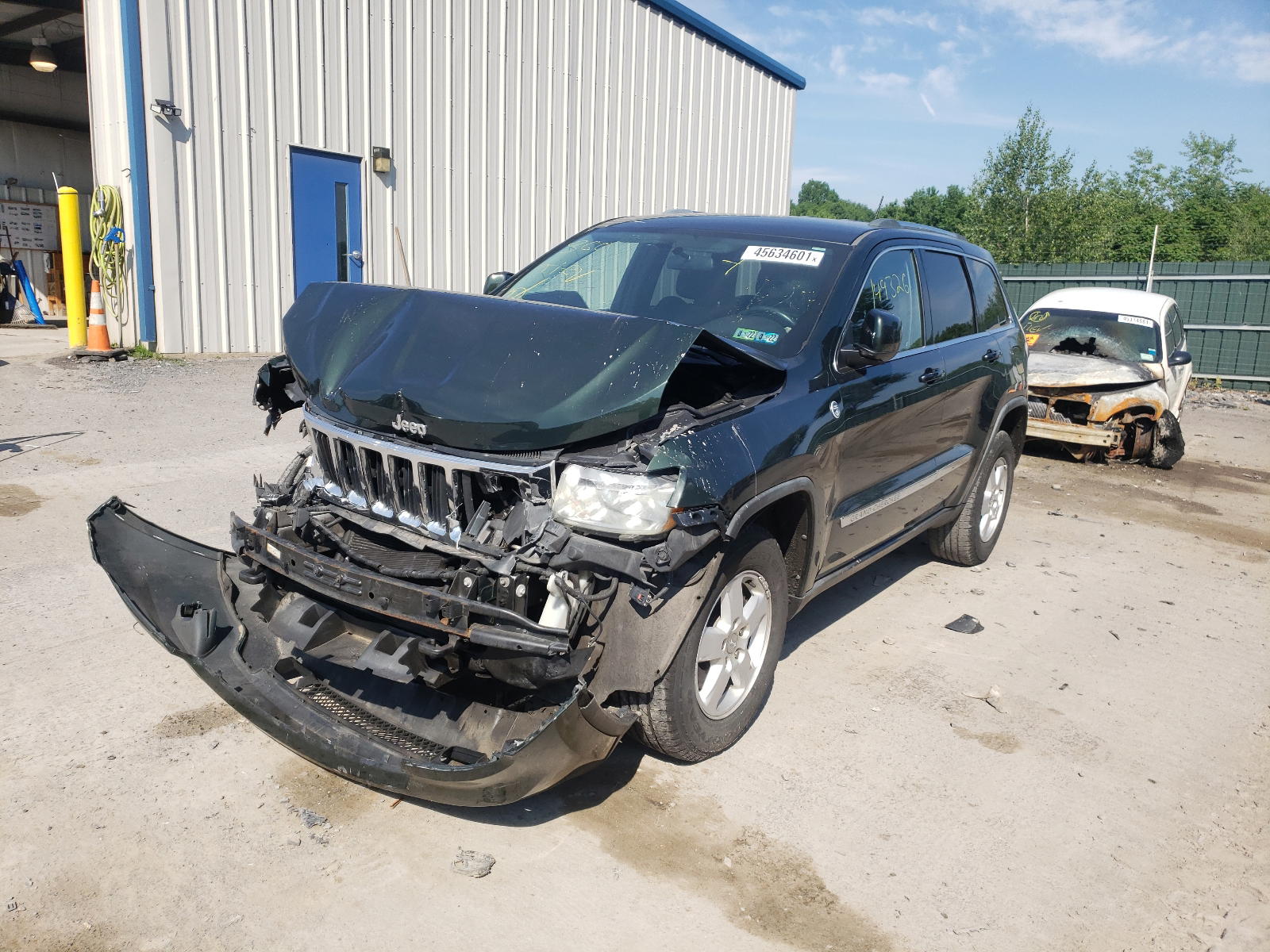 Photo 2 from auction – 2011 JEEP GRAND CHER with VIN 1J4RR4GG2BC660950