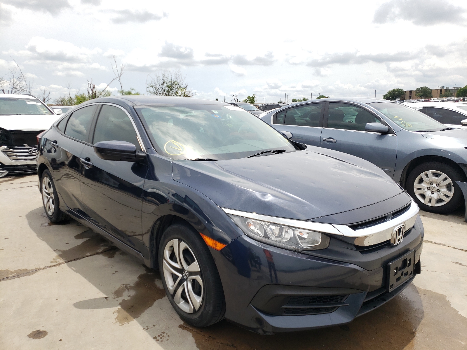 Photo 1 from auction – 2017 HONDA CIVIC LX with VIN 19XFC2F5XHE042176