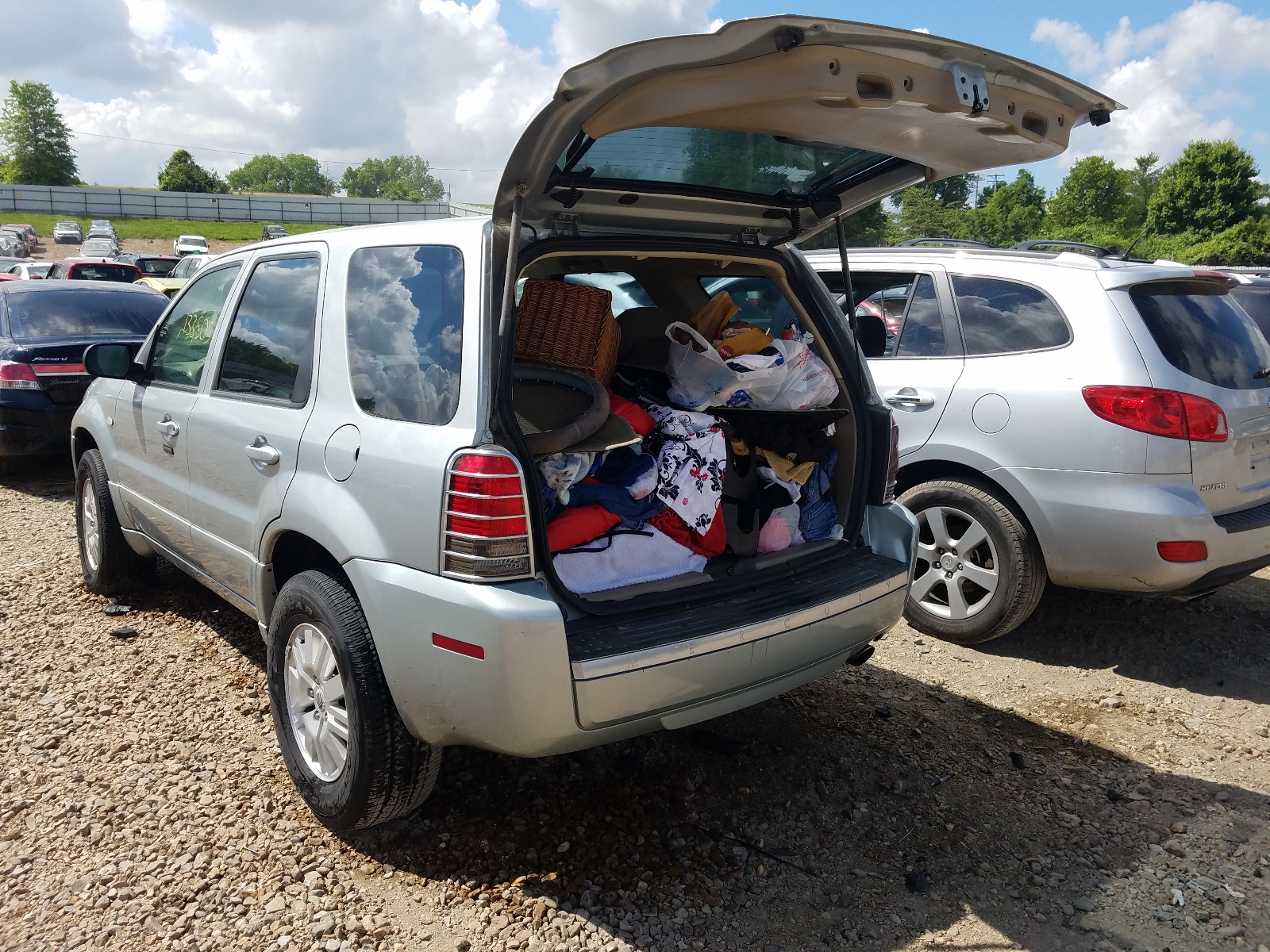 Photo 3 from auction – 2006 MERCURY MARINER with VIN 4M2YU56Z96KJ16539