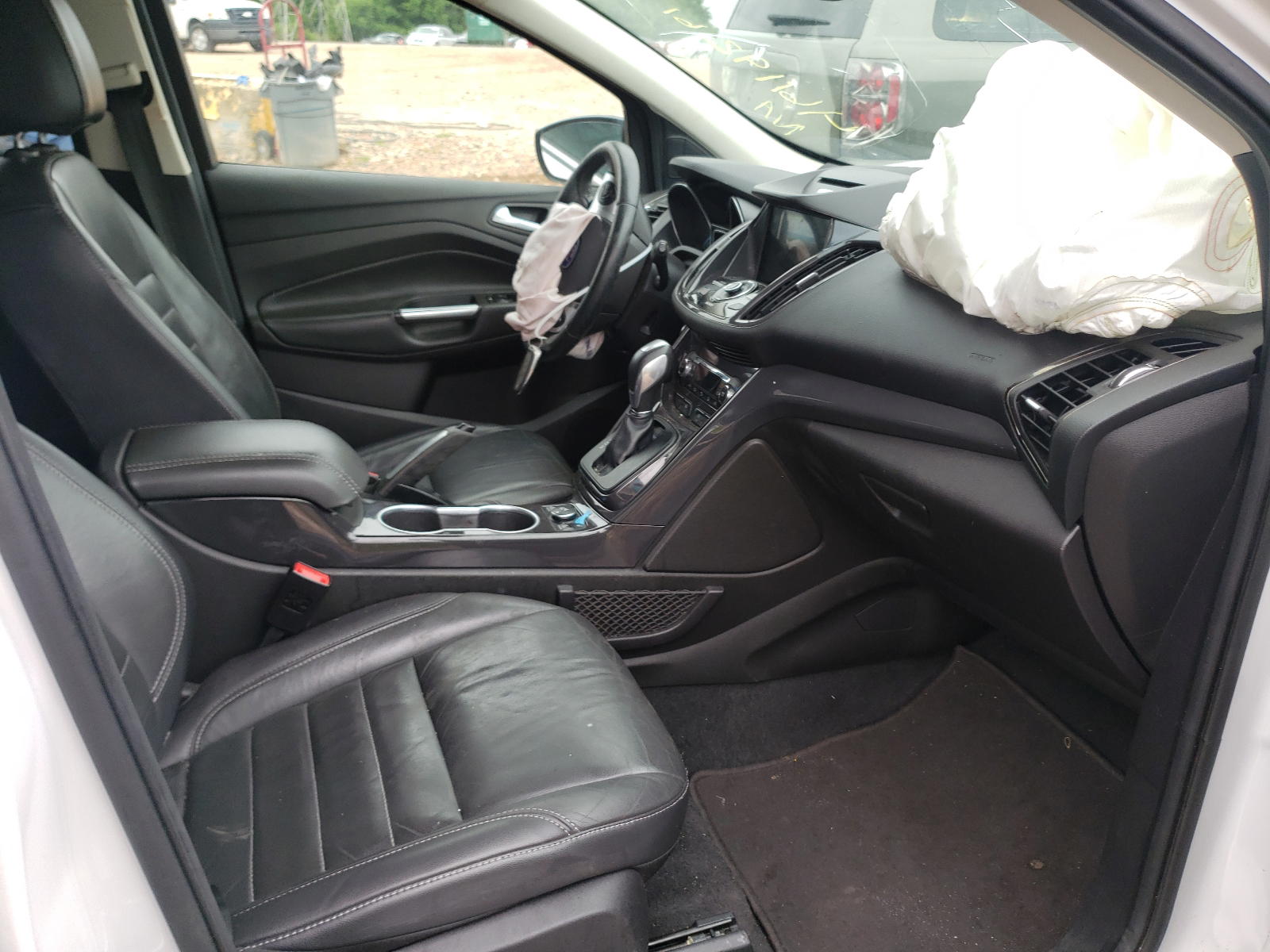 Photo 5 from auction – 2016 FORD ESCAPE TIT with VIN 1FMCU9J99GUB37360