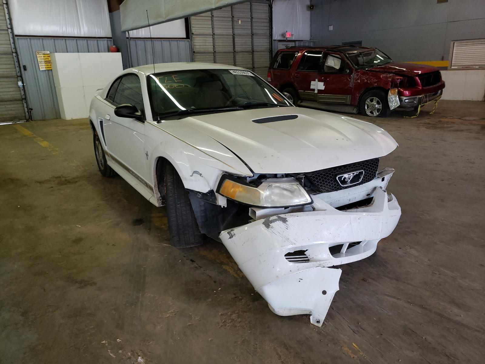 FORD MUSTANG 2002 with VIN 1FAFP404X2F155161 - Photo from auction