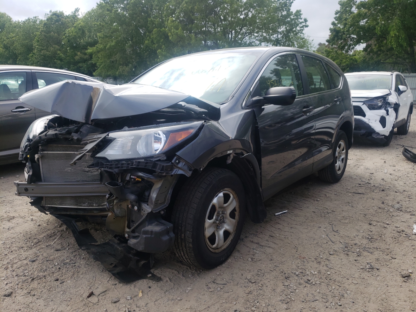 Photo 2 from auction – 2013 HONDA CR-V LX with VIN 2HKRM4H33DH611151