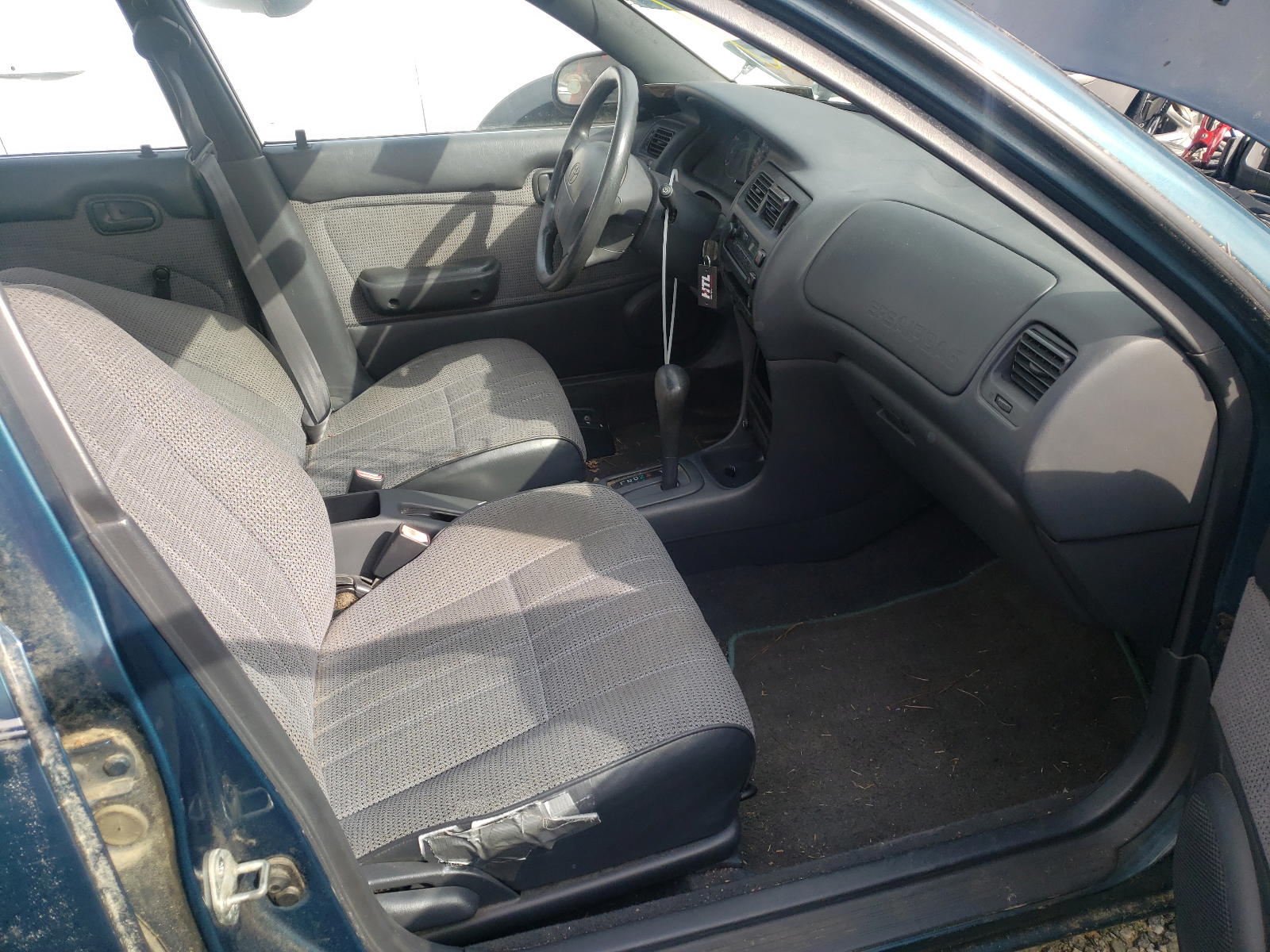 Photo 5 from auction – 1994 TOYOTA COROLLA with VIN 1NXAE04BXRZ153259