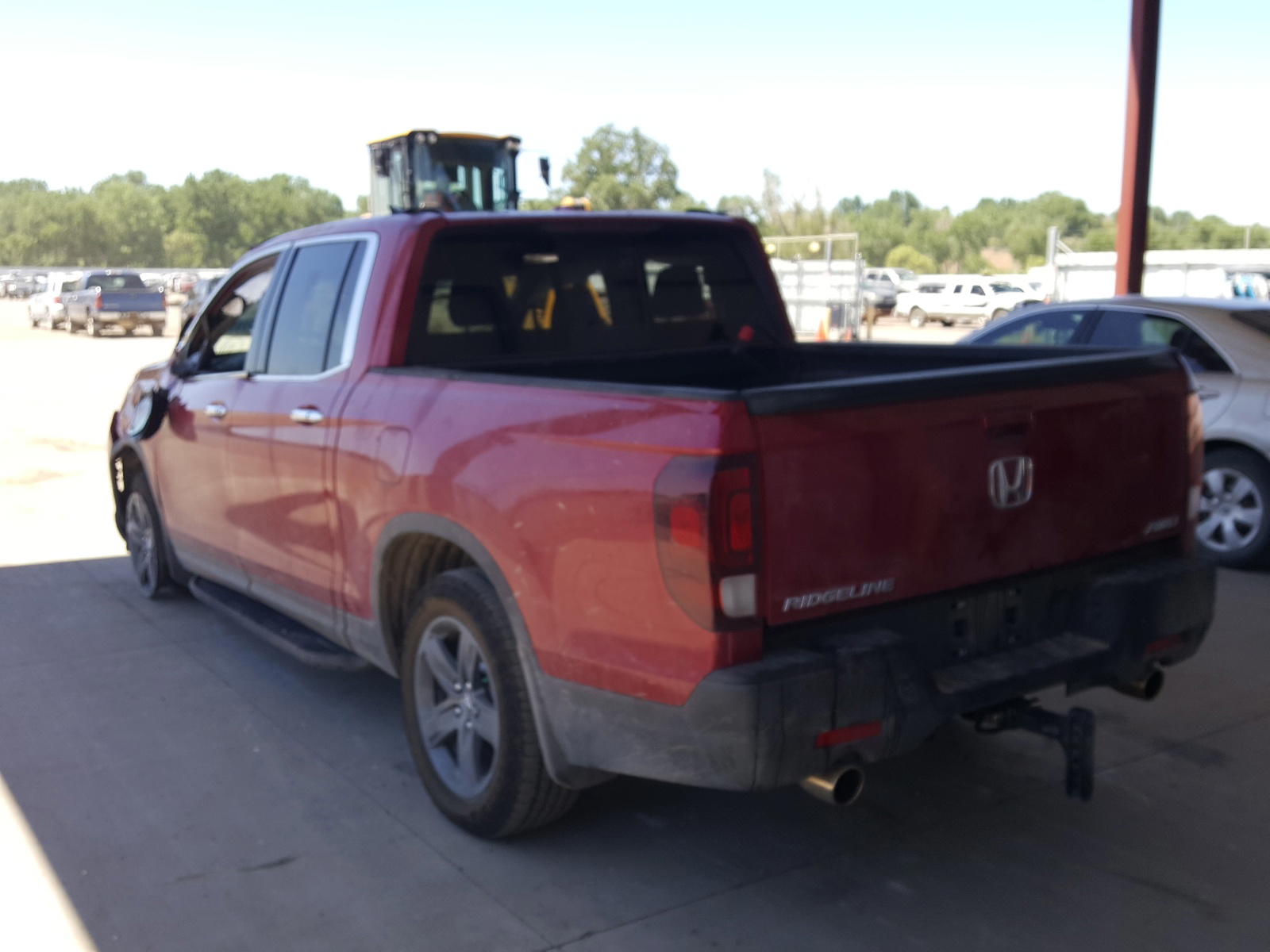 Photo 3 from auction – 2021 HONDA RIDGELINE with VIN 5FPYK3F74MB011147