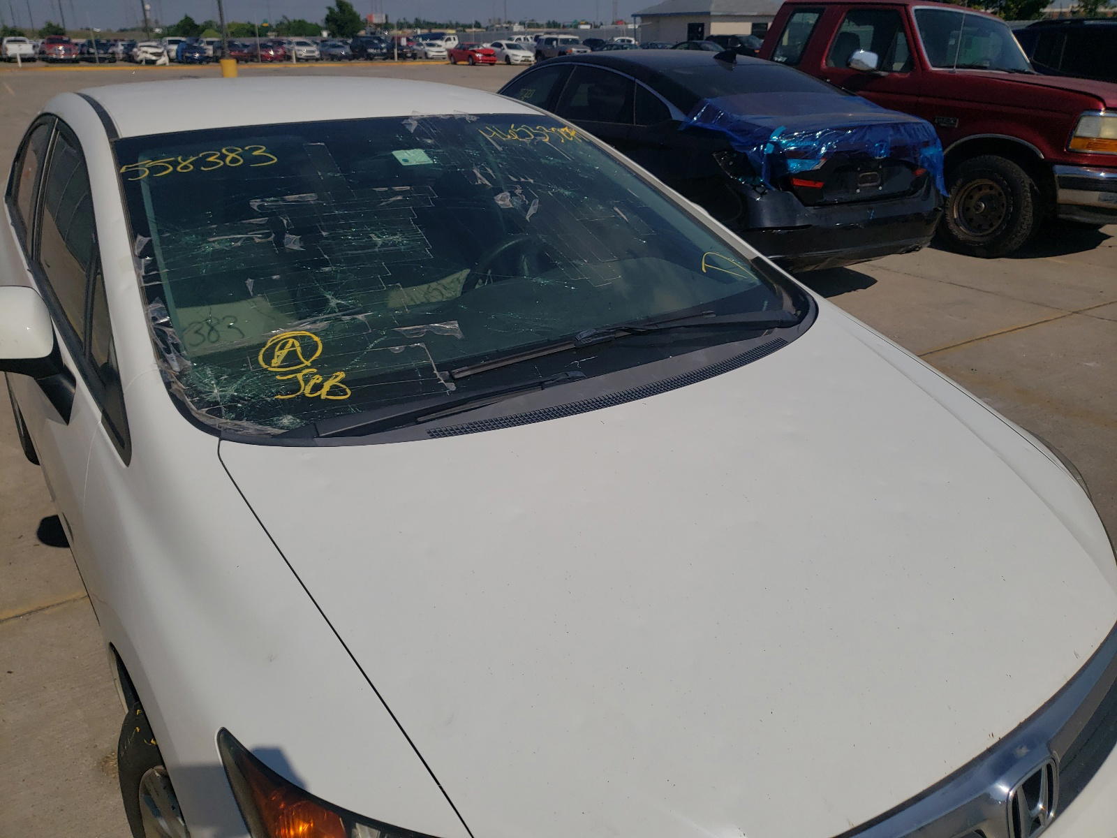 Photo 9 from auction – 2012 HONDA CIVIC LX with VIN 2HGFB2F57CH558383