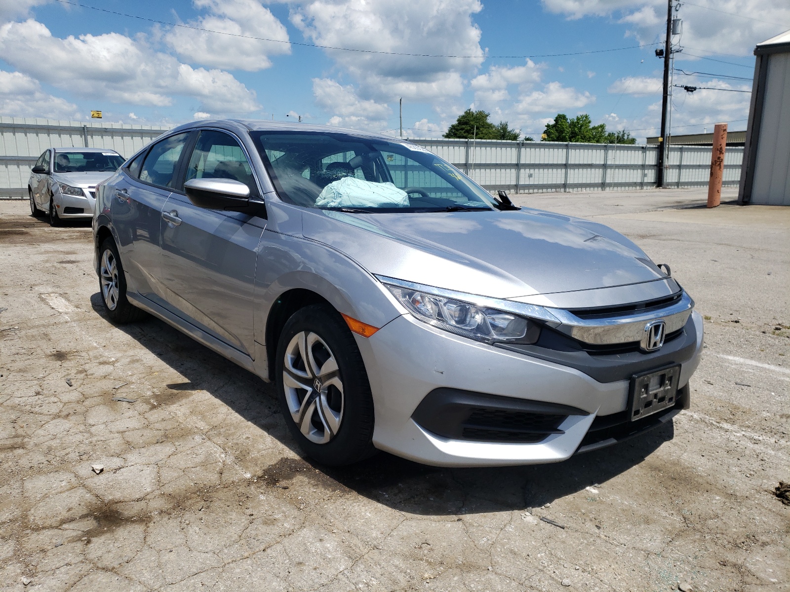 HONDA CIVIC LX 2017 with VIN 19XFC2F54HE011277 - Photo from auction