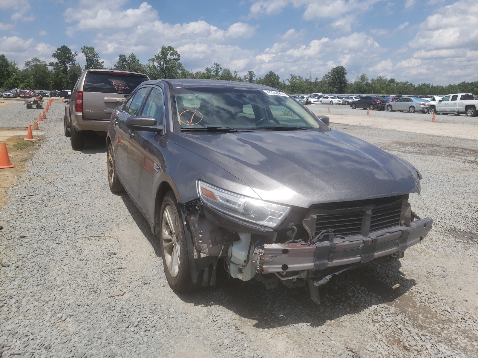 FORD TAURUS SEL 2013 con VIN 1FAHP2E94DG215403 - Foto de la subasta