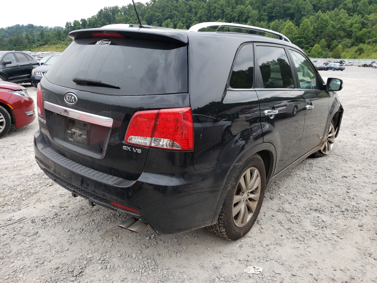 Photo 4 from auction – 2012 KIA SORENTO SX with VIN 5XYKWDA23CG210282
