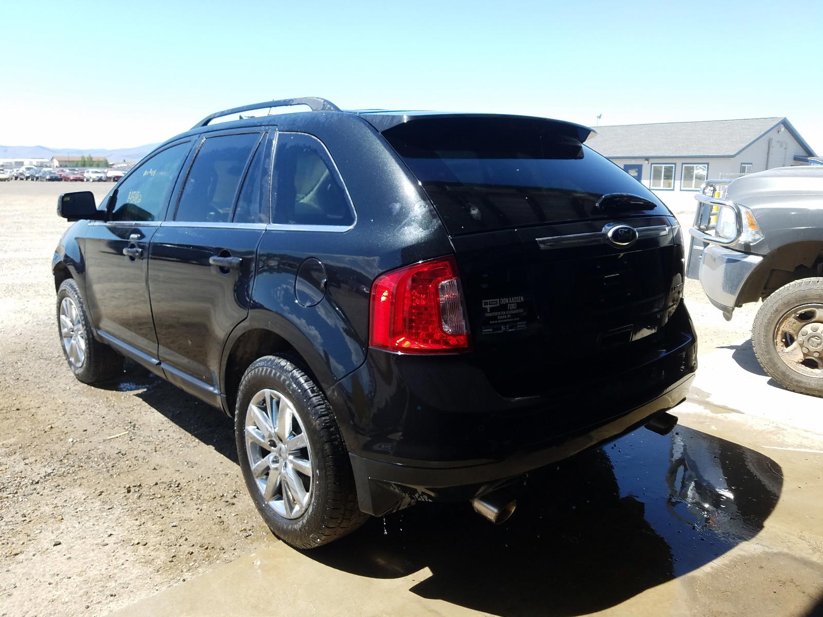 Photo 3 from auction – 2011 FORD EDGE LIMIT with VIN 2FMDK4KC3BBA57462