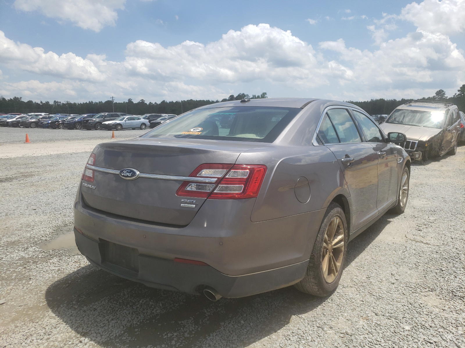 Photo 4 from auction – 2013 FORD TAURUS SEL with VIN 1FAHP2E94DG215403