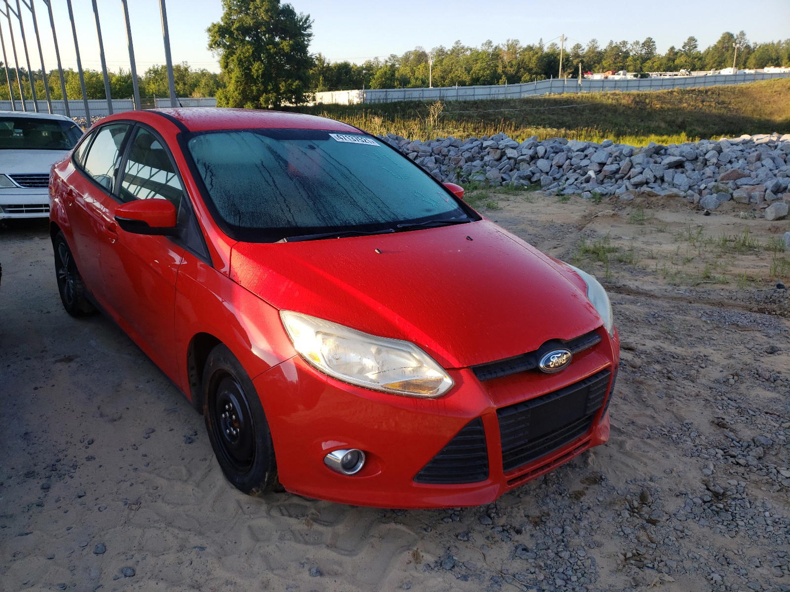 FORD FOCUS SE 2014 with VIN 1FADP3F21EL126502 - Photo from auction