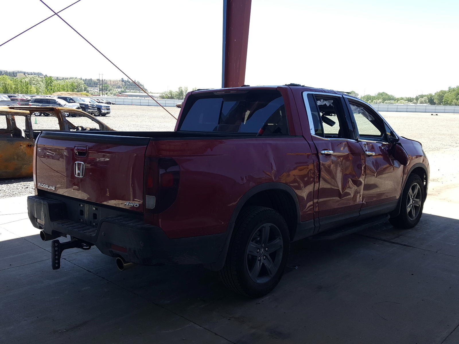 Photo 4 from auction – 2021 HONDA RIDGELINE with VIN 5FPYK3F74MB011147