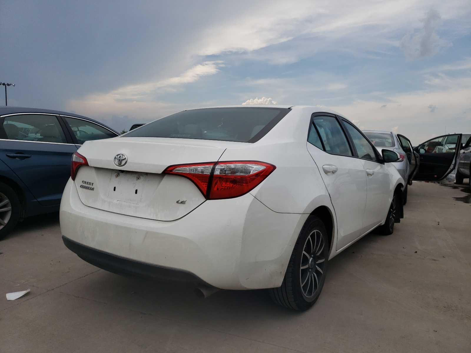 Photo 4 from auction – 2014 TOYOTA COROLLA L with VIN 5YFBURHE5EP096187