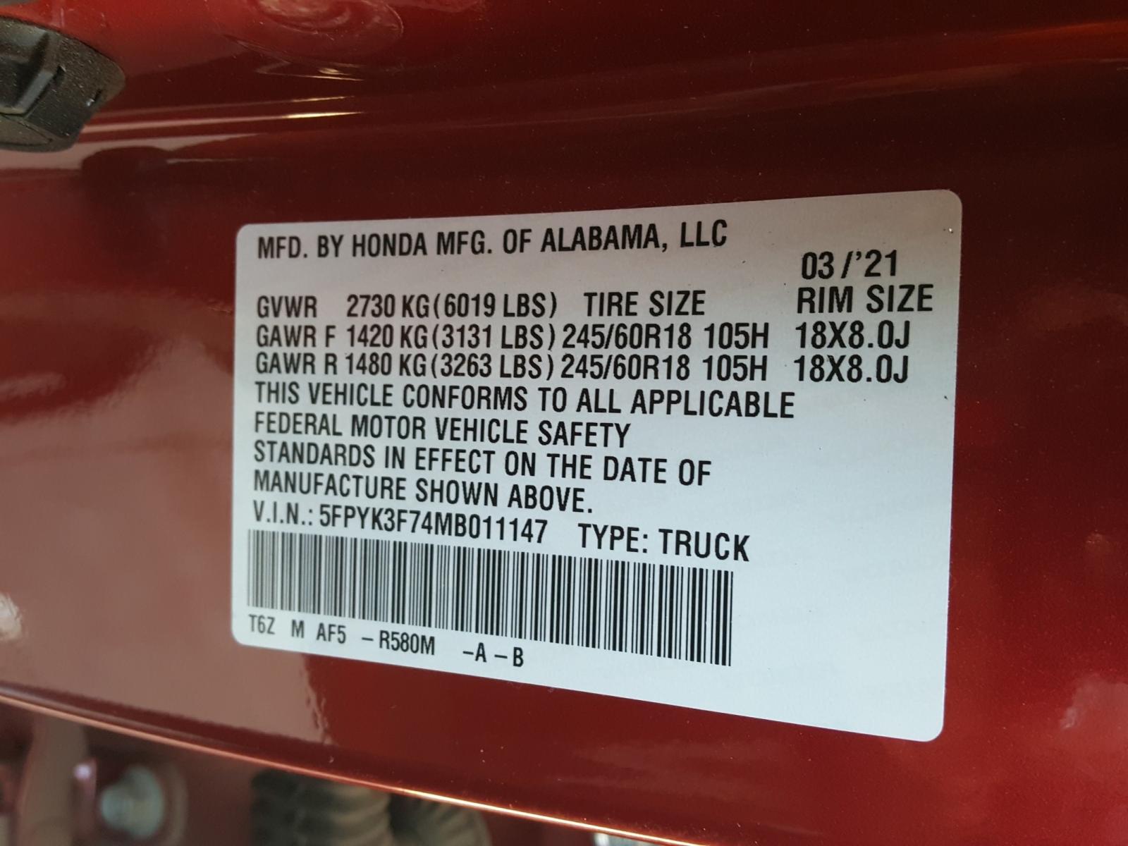 Photo 10 from auction – 2021 HONDA RIDGELINE with VIN 5FPYK3F74MB011147