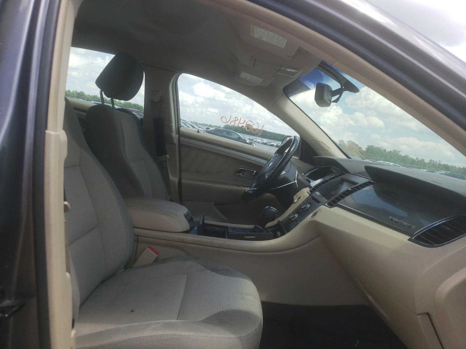 Photo 5 from auction – 2013 FORD TAURUS SEL with VIN 1FAHP2E94DG215403