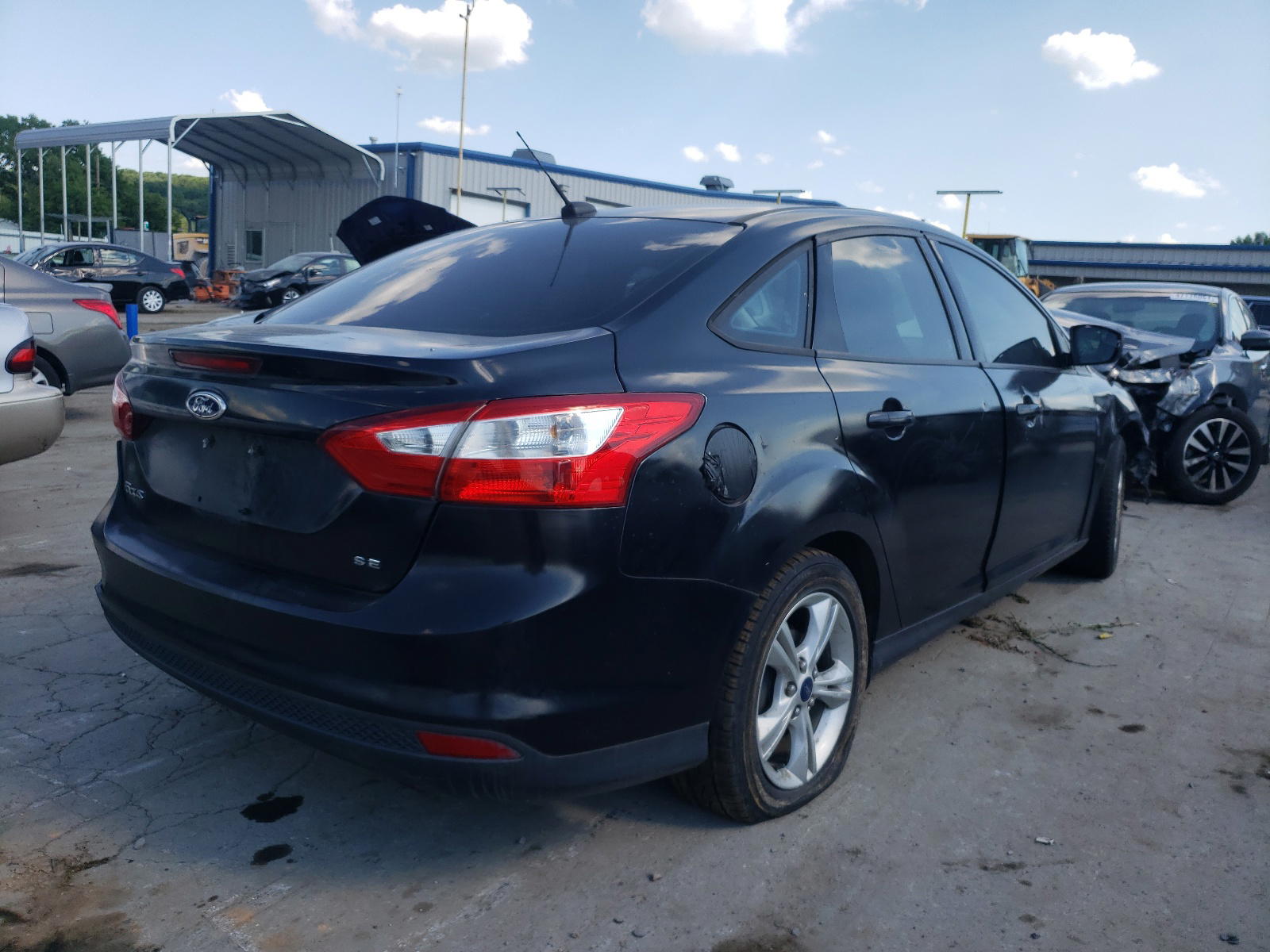 Photo 4 from auction – 2014 FORD FOCUS SE with VIN 1FADP3F22EL410124