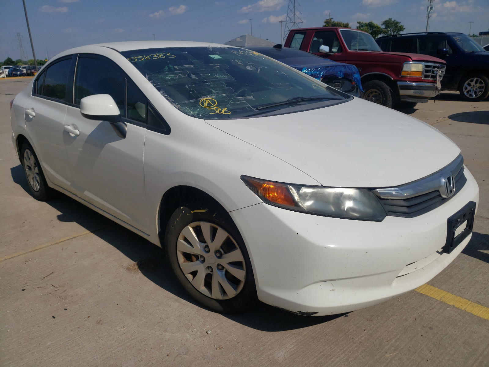HONDA CIVIC LX 2012 with VIN 2HGFB2F57CH558383 - Photo from auction
